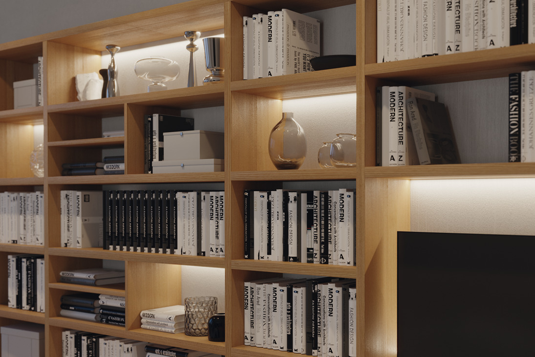 Cinta LED Hafele integrada en repisas de biblioteca para destacar objetos decorativos