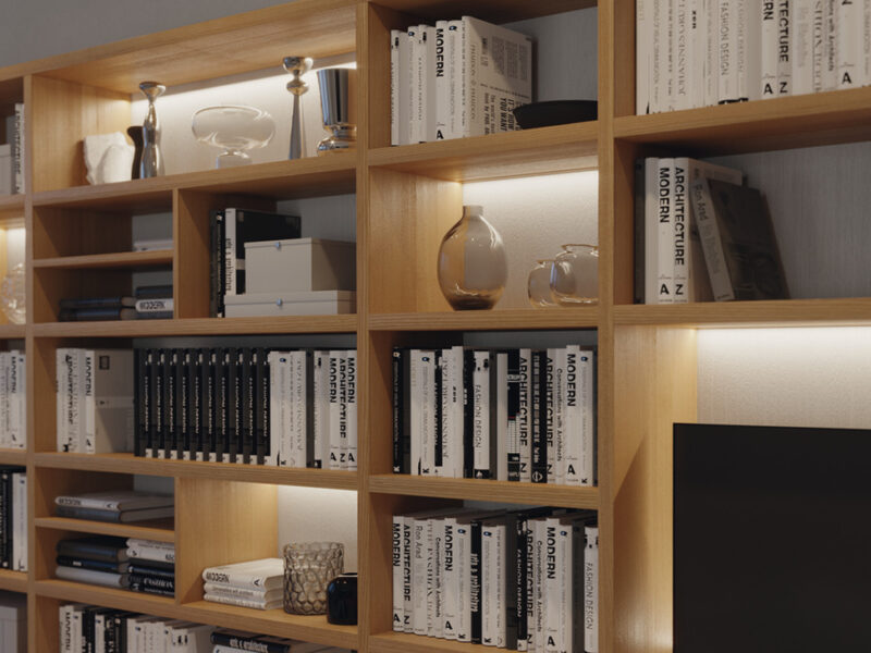 Luz LED Hafele en repisas de biblioteca